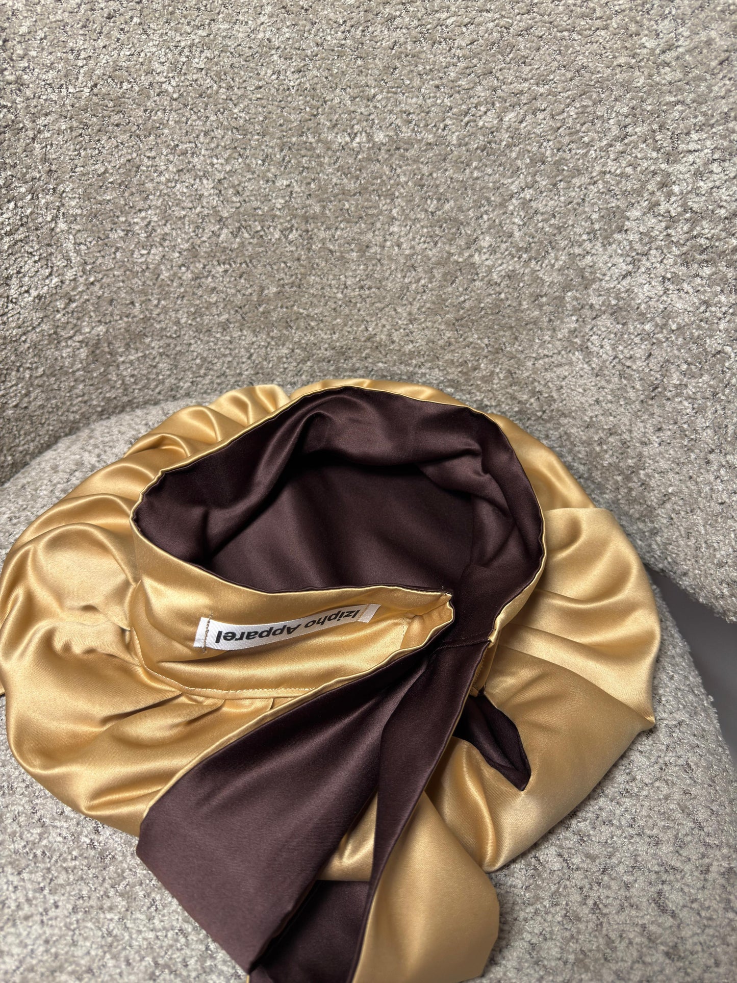 Reversible satin bonnet