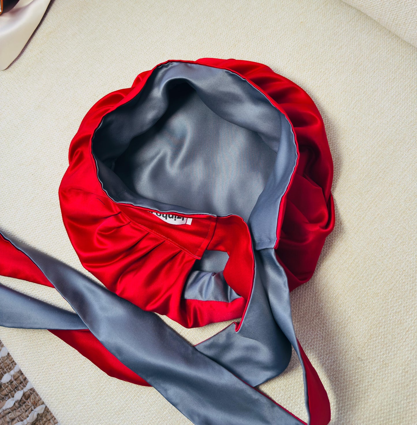 Reversible satin bonnet